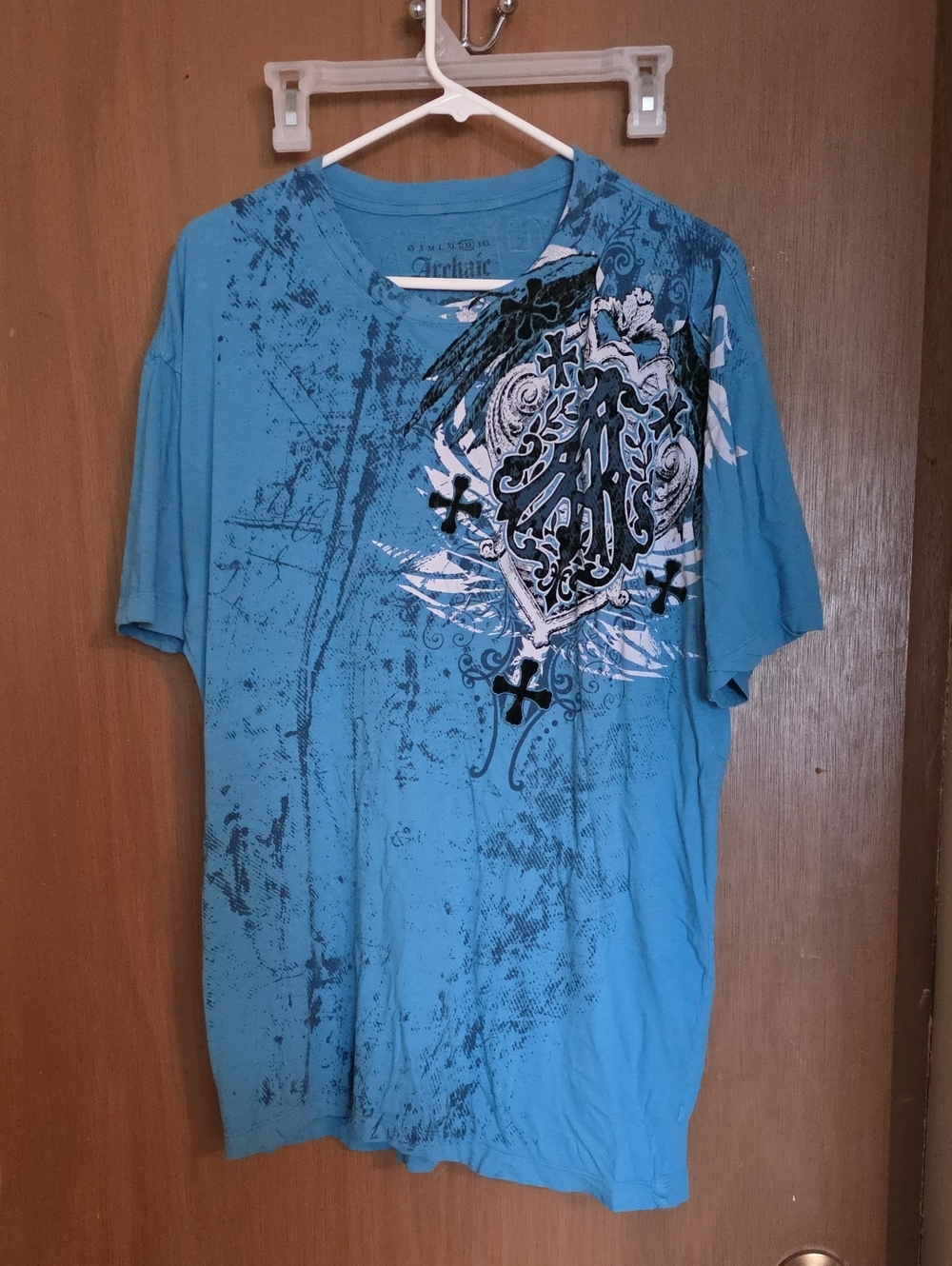 Archaic Blue Graphic Short-Sleeve Tee with Ornamental Crest